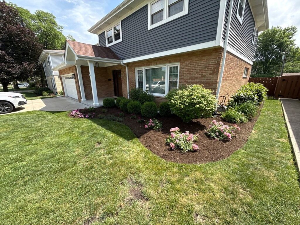 Fresh mulch beds with clean edges
